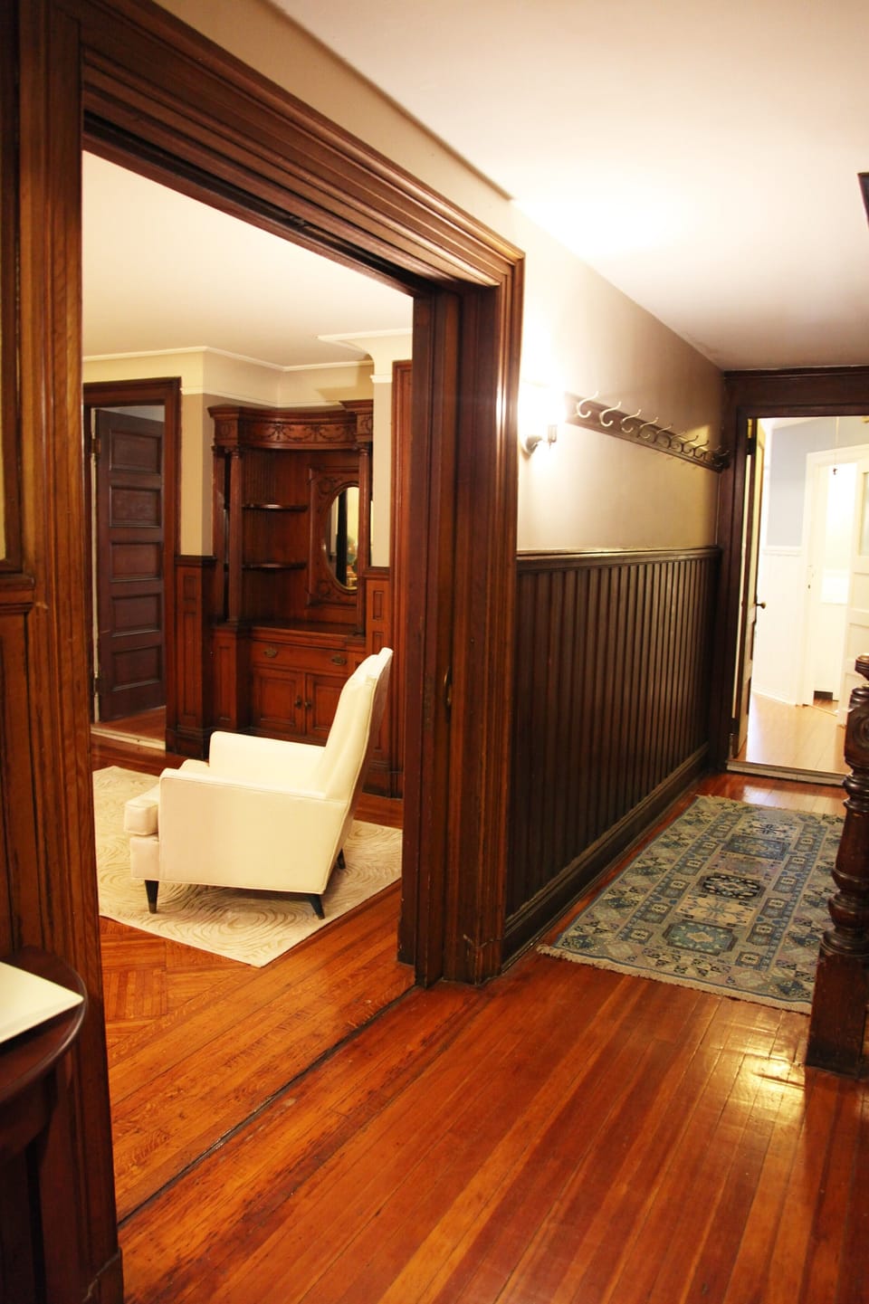 Foyer with ample space for shoes, jackets, and luggage.