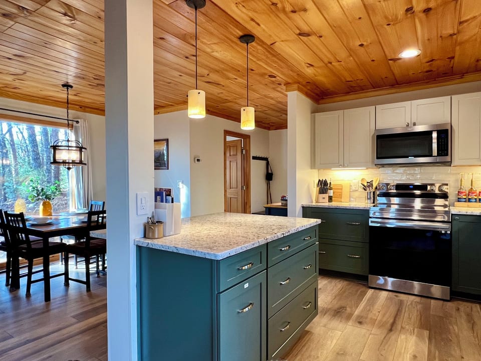 Reverse view shows the new kitchen and dining area