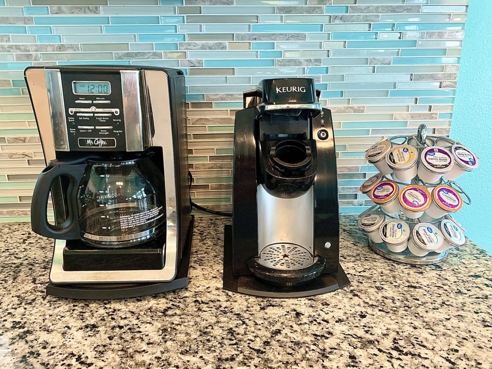 12 cup coffee maker, Keurig, and an assortment of K-cups
