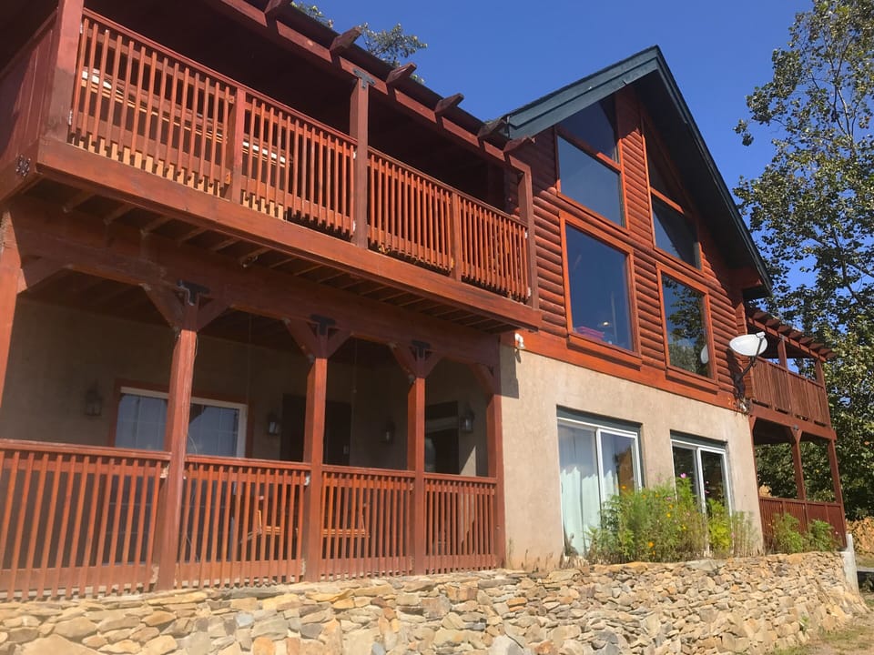The Gatlinburg Lodge with new, 65-foot long stone wall topped with flower garden