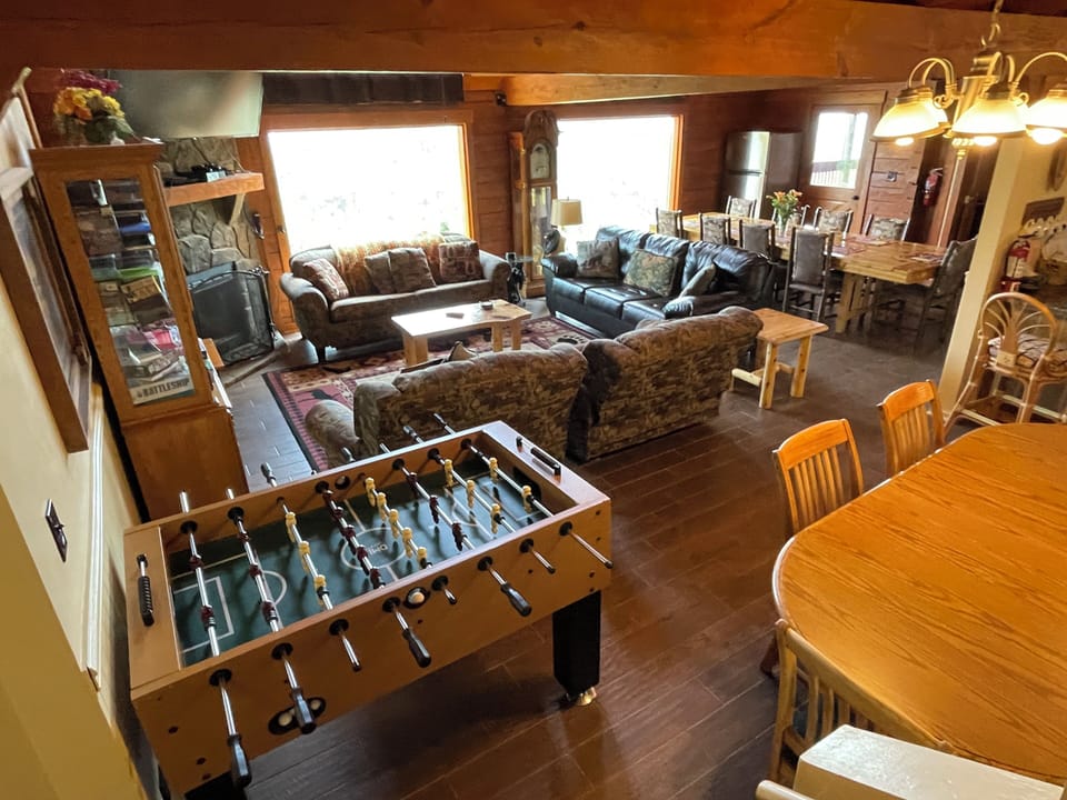 Great Room: Living Area (Left) Large Dining Table (Top) and Small Dining (Right)