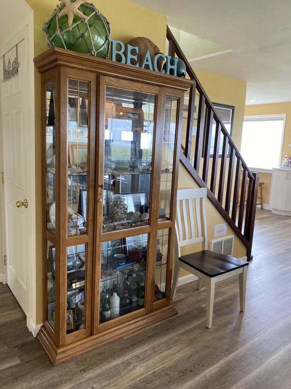 Display of shells, glass balls & bottles, coal, remnants of the hotel & history.