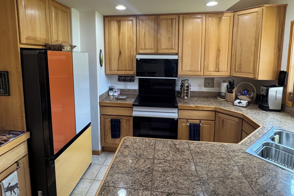 Fully Stocked Kitchen with upgraded appliances. Has everything you would need.