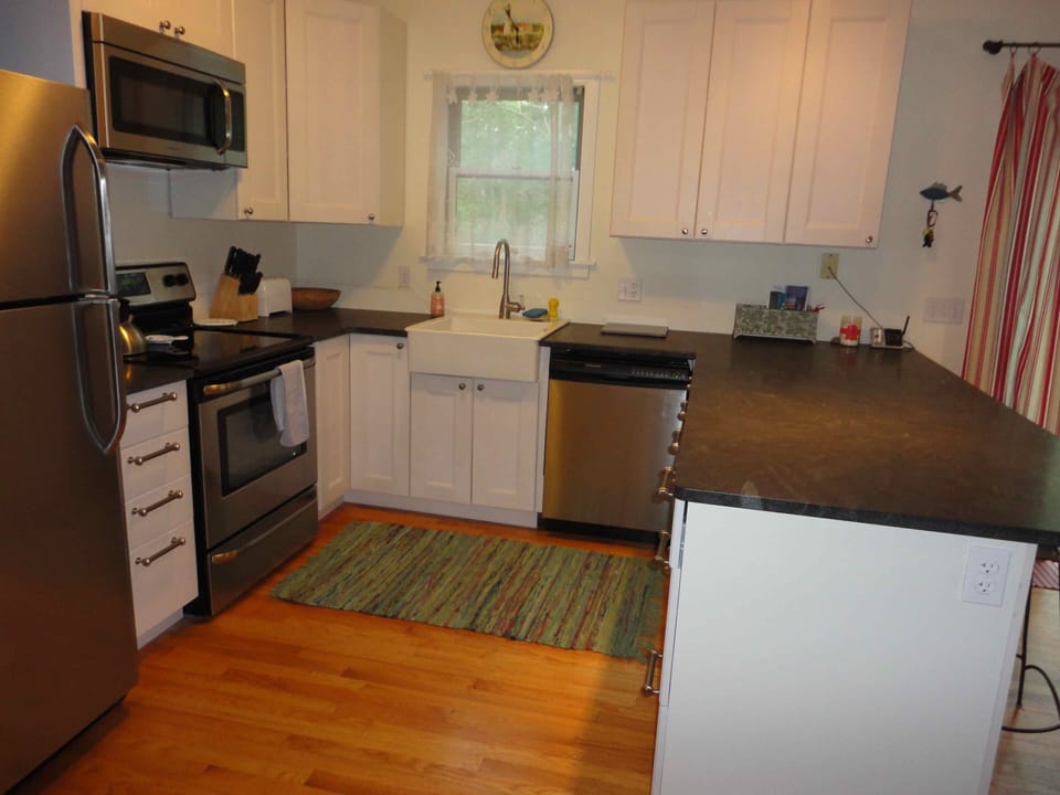 Well stocked kitchen with everything you will need. There are 3 countertop stool