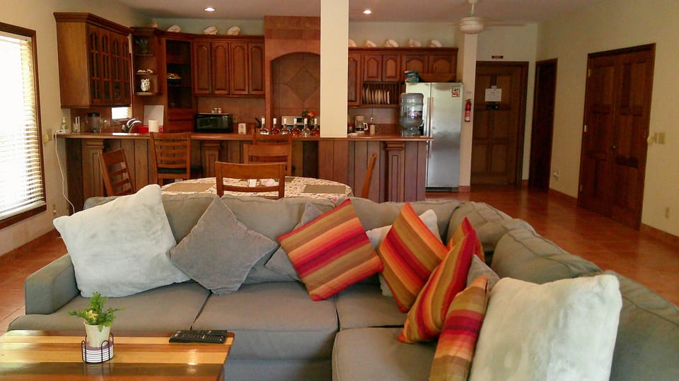 Spacious living area and gourmet kitchen with full amenities.