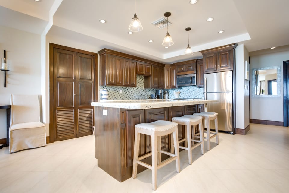 Kitchen has an 8 foot island