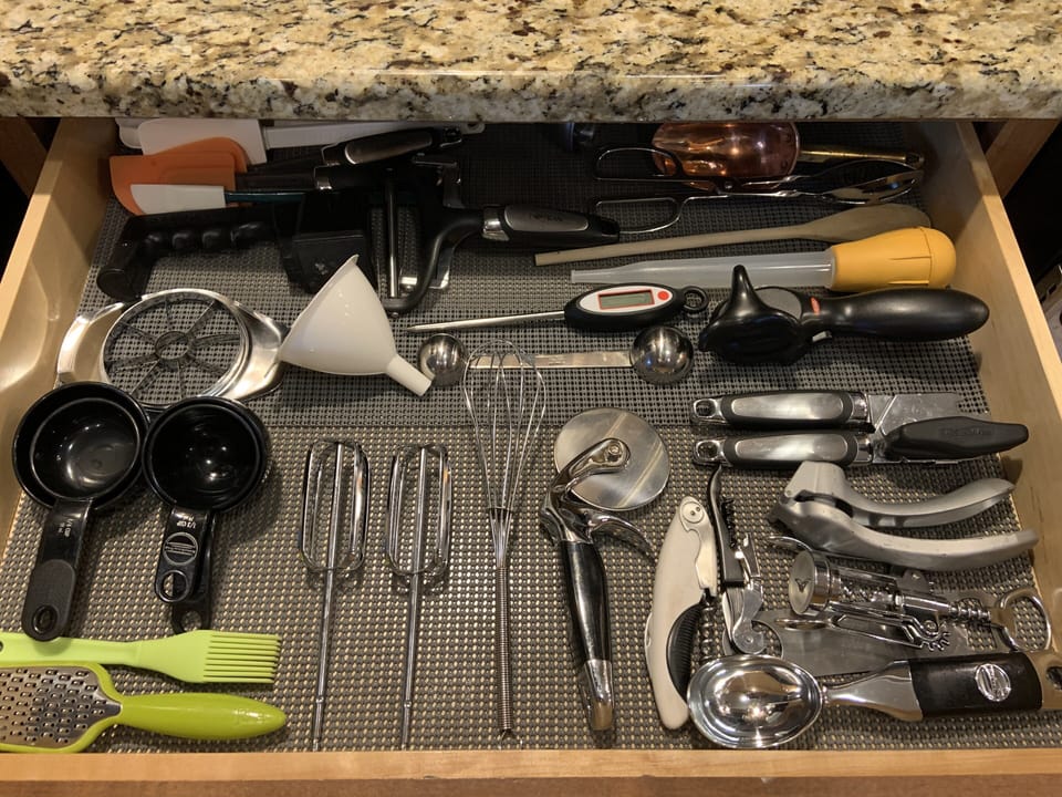 A variety of kitchen utensils. Not pictured: variety of spices, non stick spray