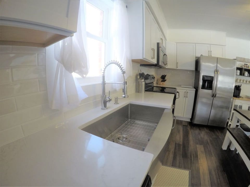 New kitchen with quartz counters and huge stainless farmhouse sink!
