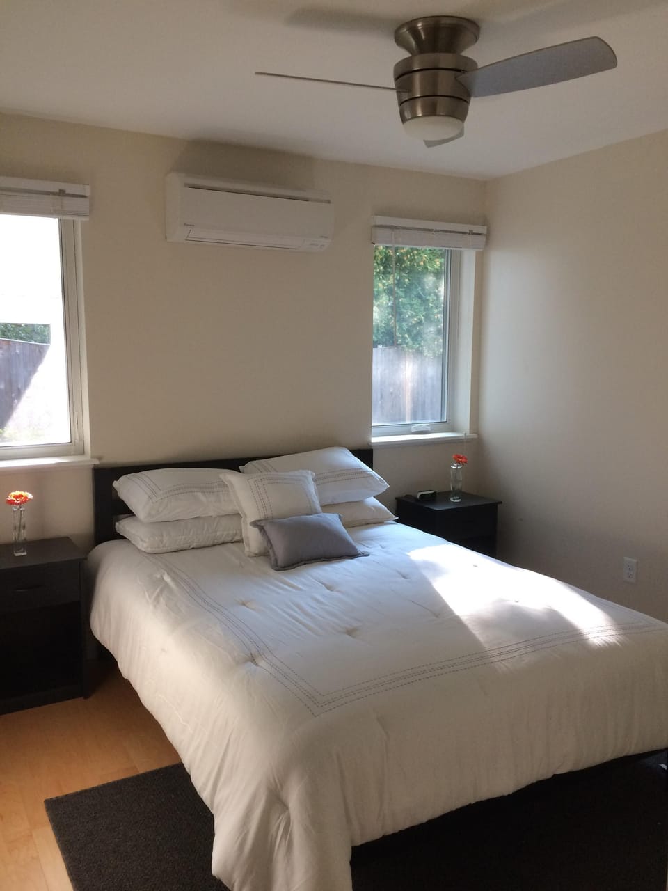 Bedroom with window shades open