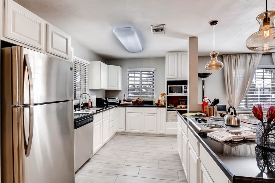 Fully equipped kitchen sports stainless steel for functionality&sleek appearance