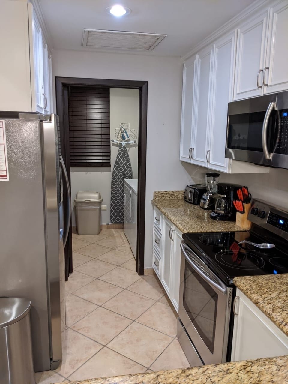 Dishwasher, toaster, coffee maker, blender. Dishes, glasses, pots and pans.