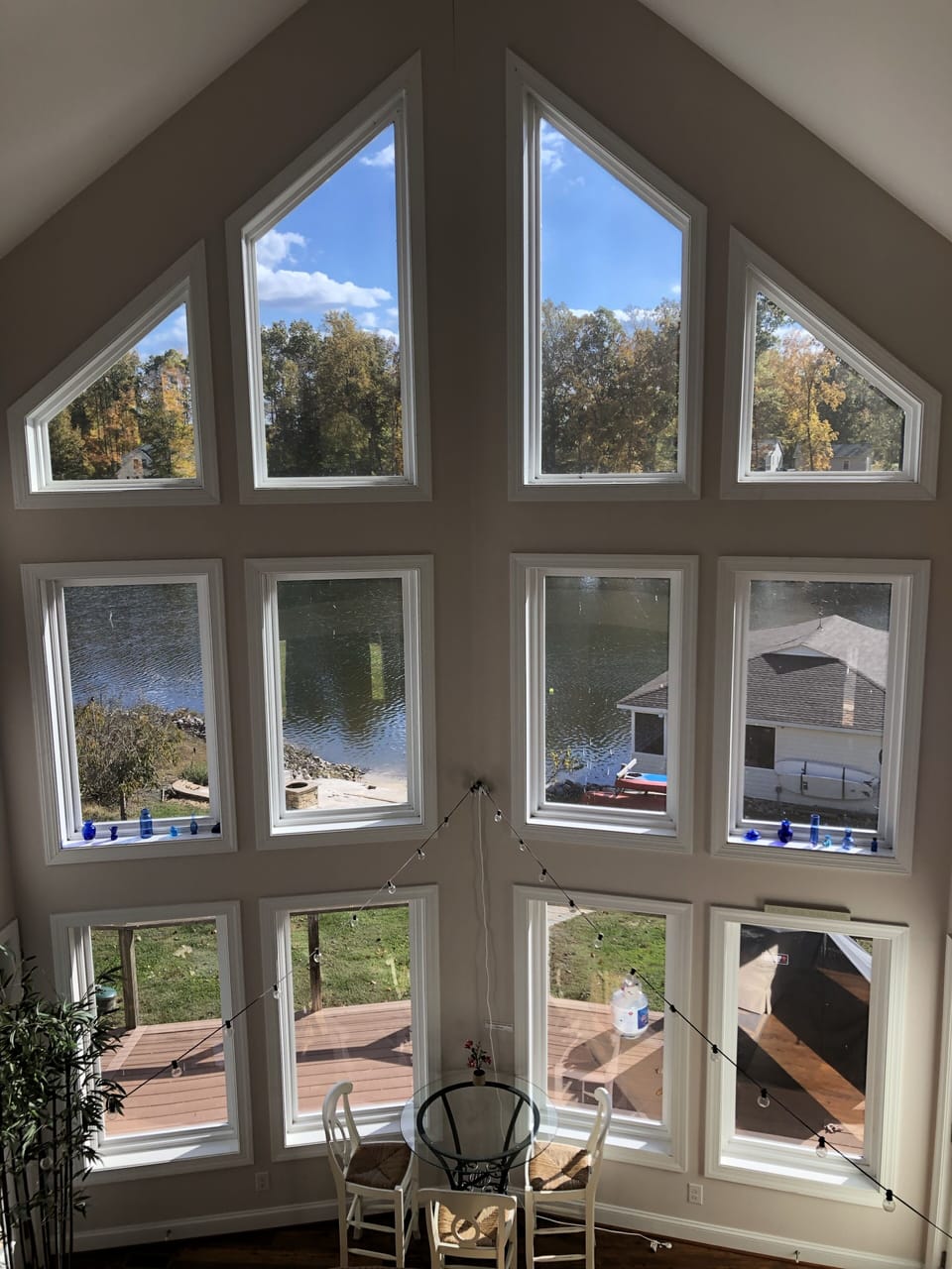 Two-story windows with views of lake