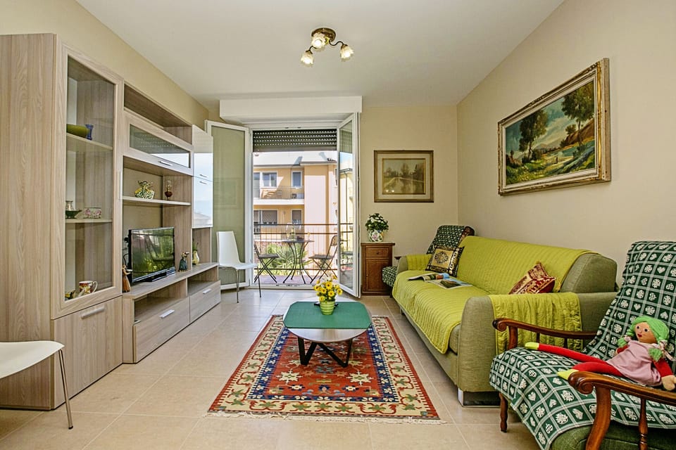 Large living room leading onto the balcony