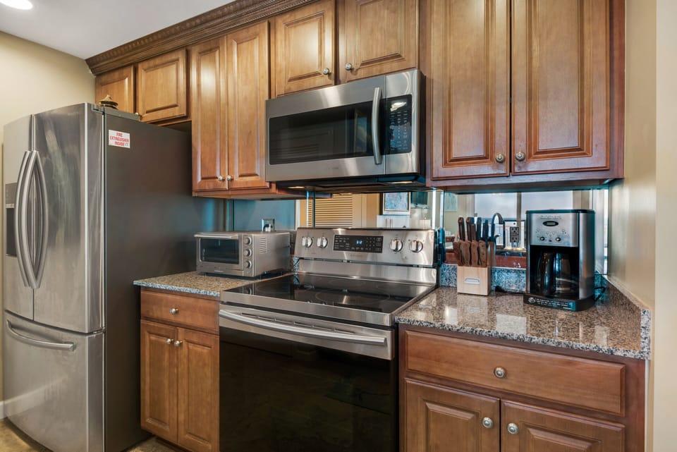 The kitchen has all updated stainless steel appliances.
