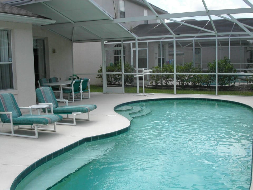 Pool - with lg. table, 6 chairs, BBQ, clothes dryer and alot of place to stay