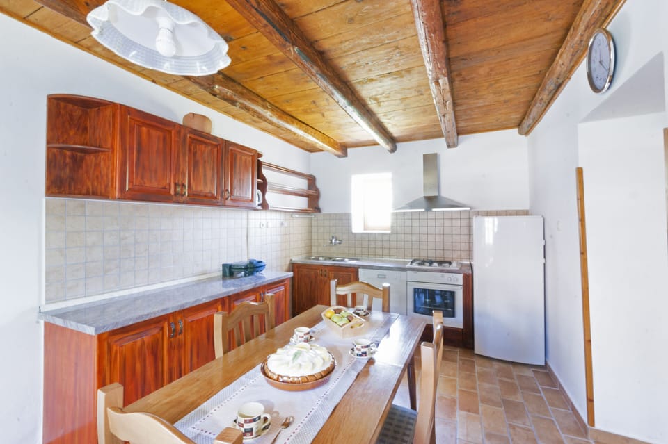 Kitchen, well equipped, right next to the living room