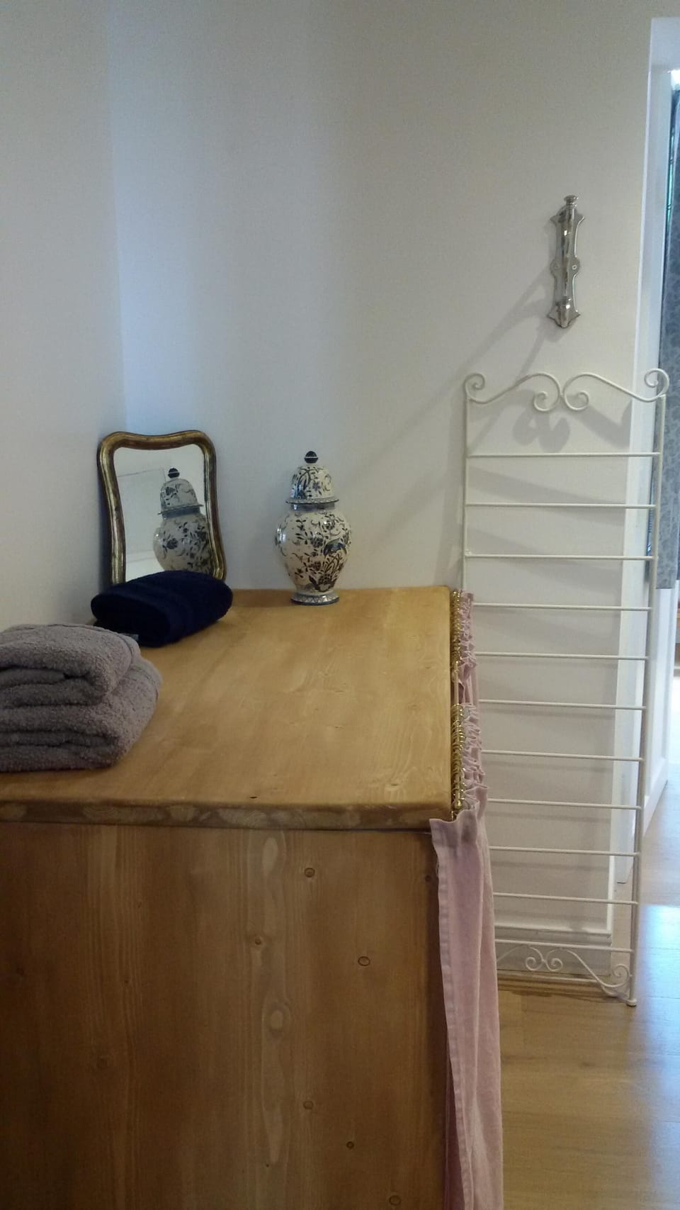 Washing machine under the table that could serve as a changing table