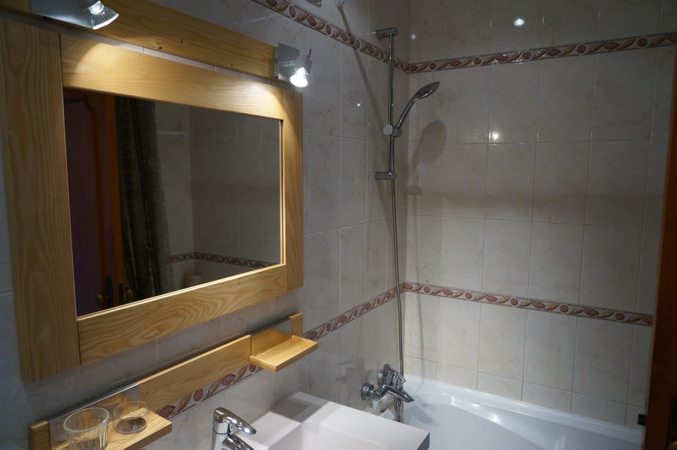 Bathroom with bath and toilet