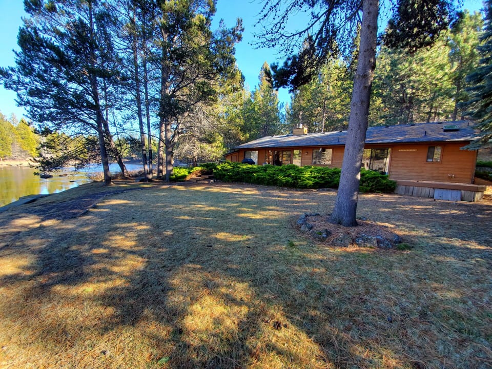 River view back yard and view of the house.