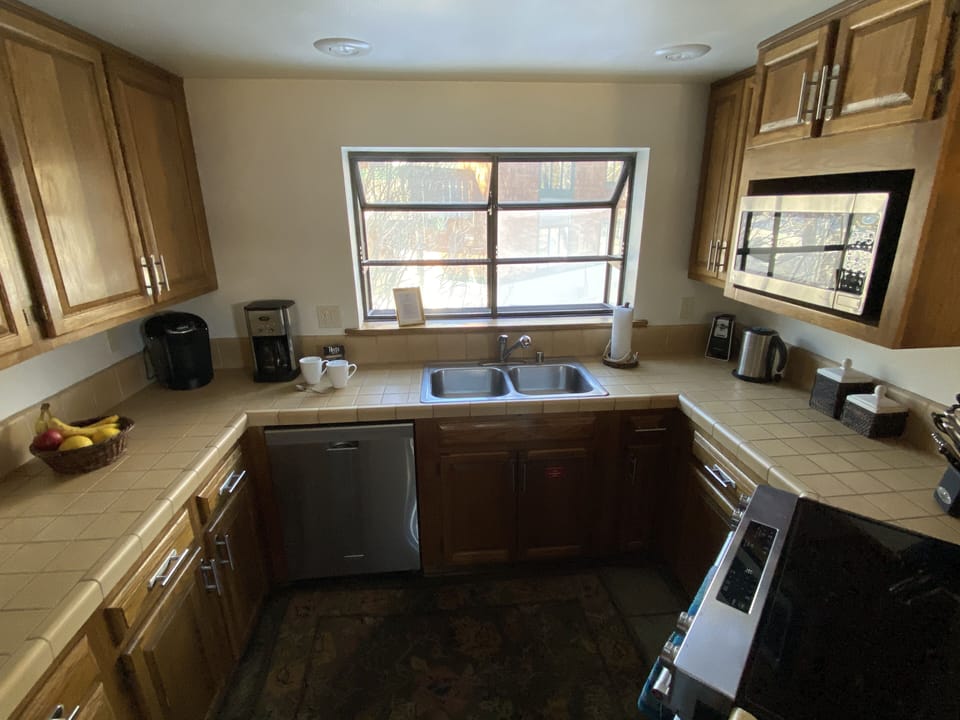 Kitchen - fully stocked for cooking needs! (2nd floor).