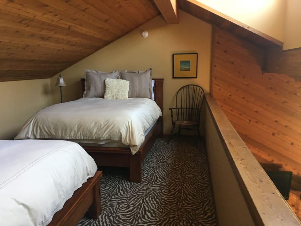 Loft: 1 queen bed, 1 full bed and ceiling fan. (3rd floor)