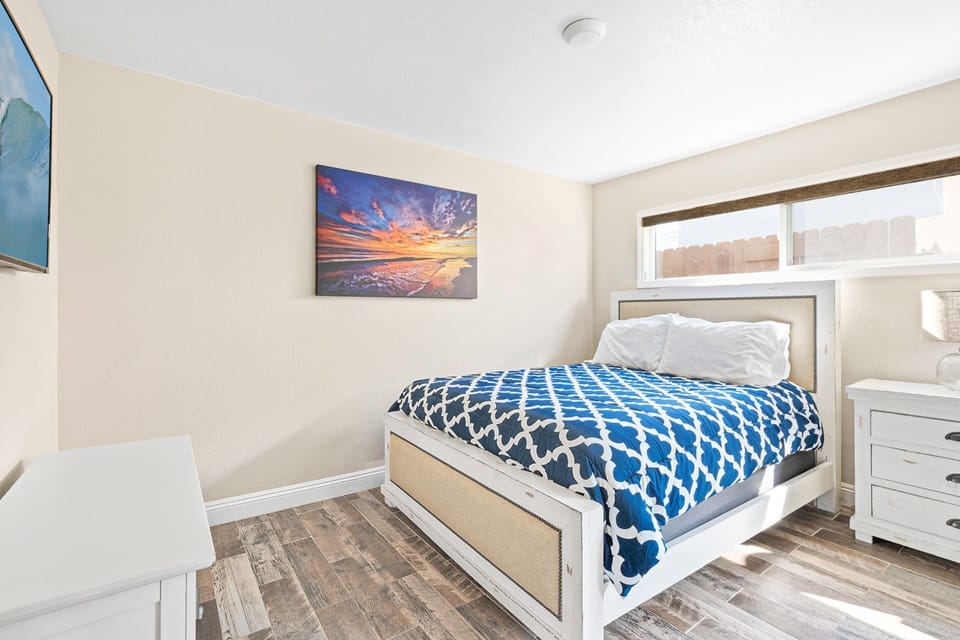 The primary bedroom includes a queen bed and Roku TV.
                