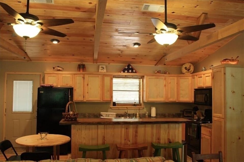 Bar/Kitchen Area - Fully furnished kitchen with stunning walnut bar top!