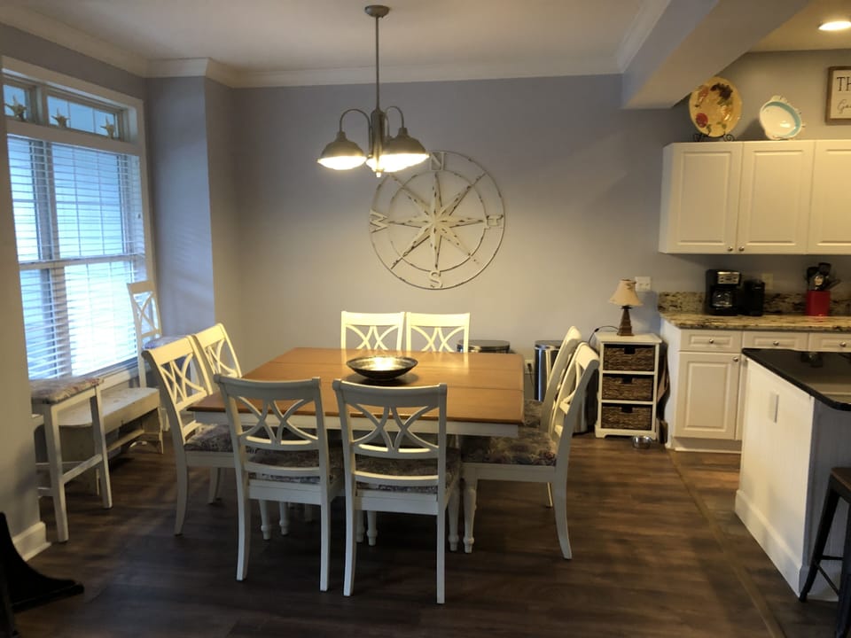 Open dining area off kitchen and living room