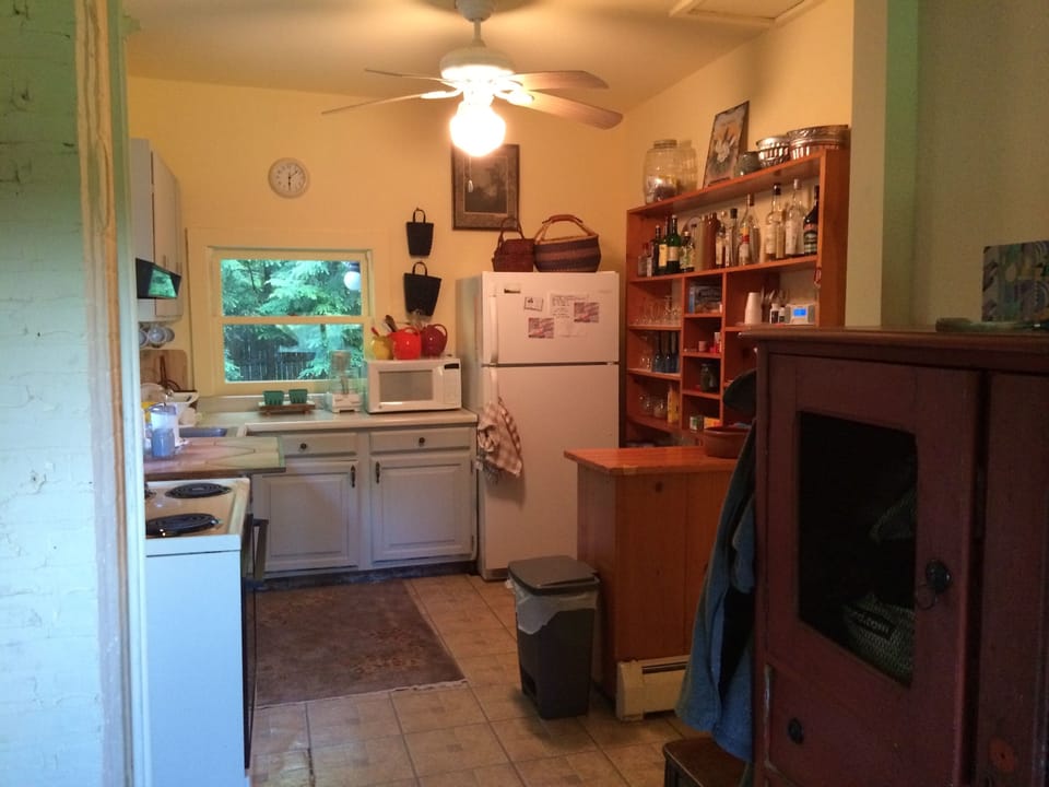 The kitchen.  The back door is to the left and the dining room to the right.