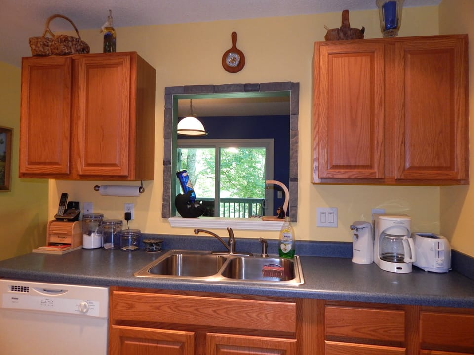 Kitchen with oak cabinets, dishwasher, disposal and all appliances.