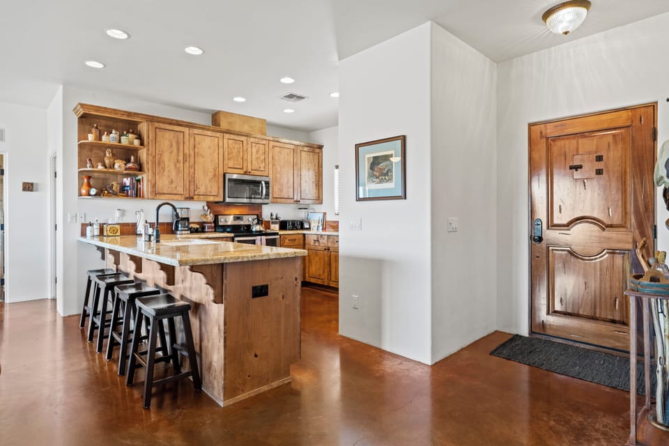 front entry and kitchen