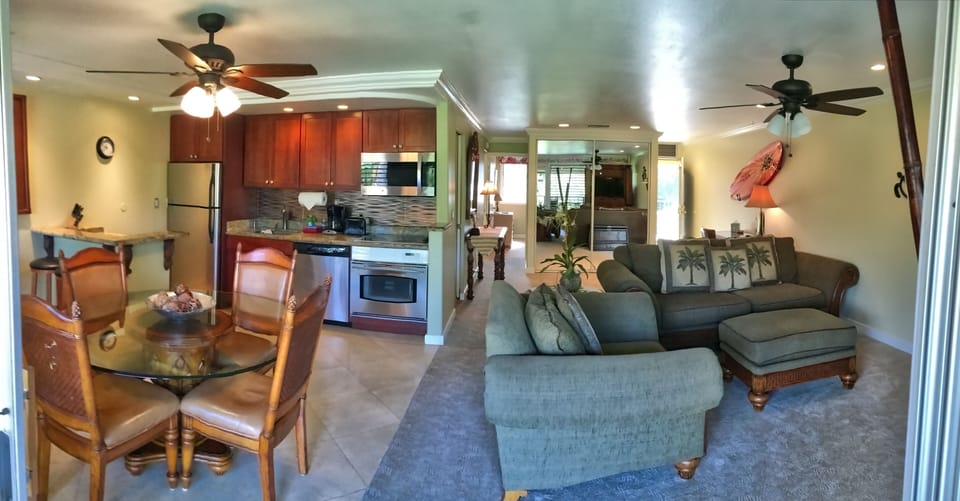 Panorama of front room and dining room.