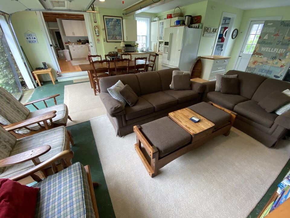 Zip up full screened in garage, easy access to fire pit and yard.