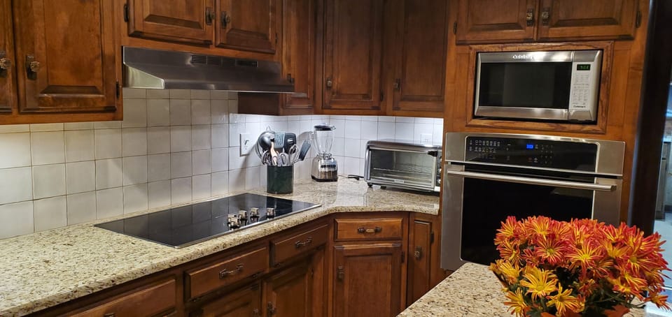 Kitchen updated with new countertop and backslash in September 2022