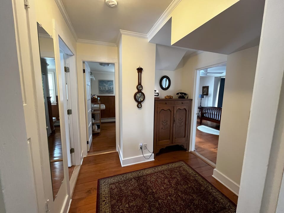 Second floor landing.  Queen room to the right, bath straight ahead.