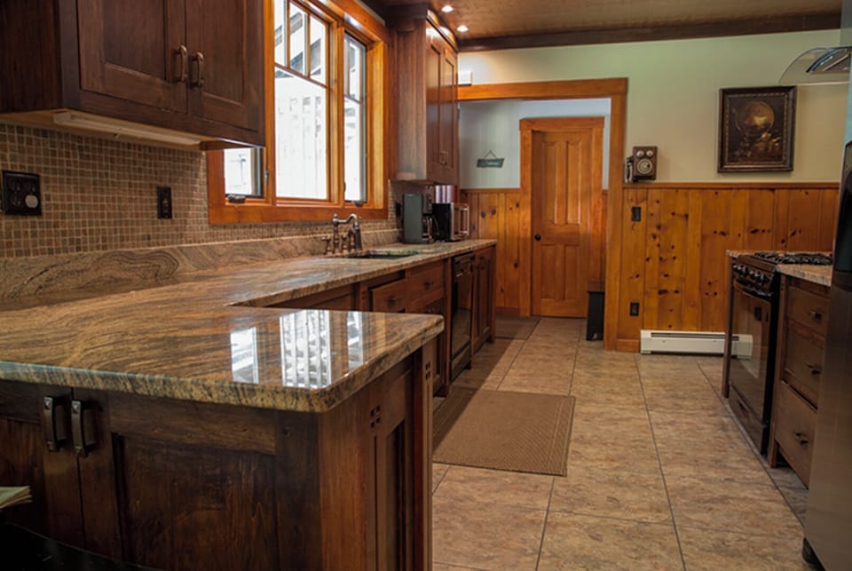 View of kitchen from dining room table