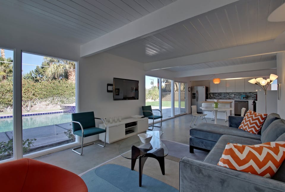 Open floor plan with lots of windows. Indoor/Outdoor living at it's finest