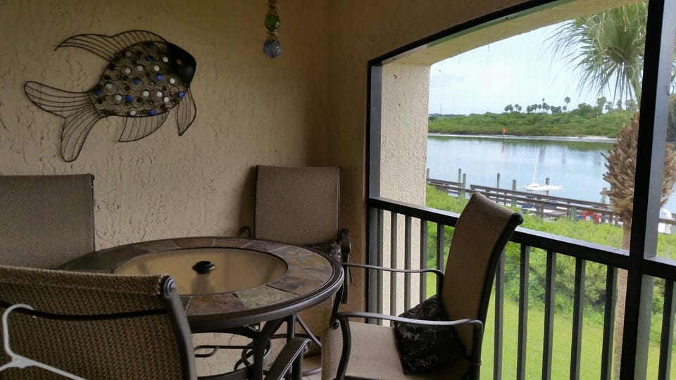 Table and chairs out back are perfect for eating outside
