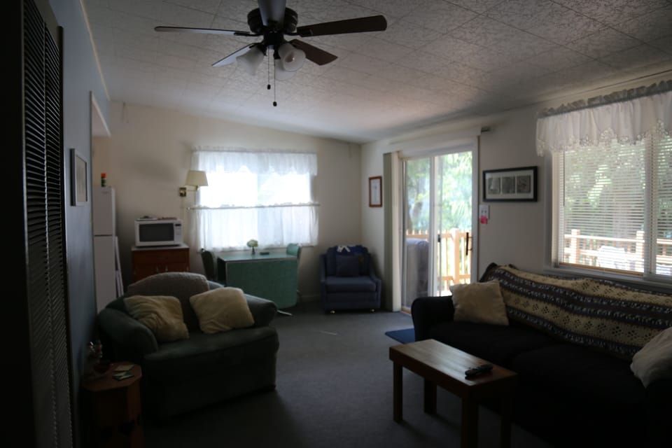 Looking west in the living room.  Kitchen to the left.