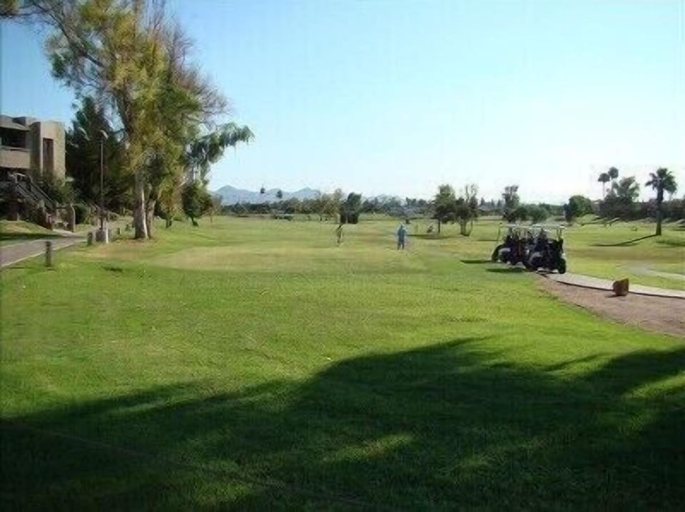Condo is located near the golf course