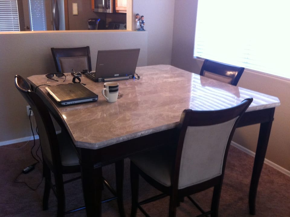 Morning coffee or Internet surfing. Will seat 8. 