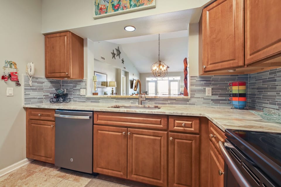 New granite and backsplash