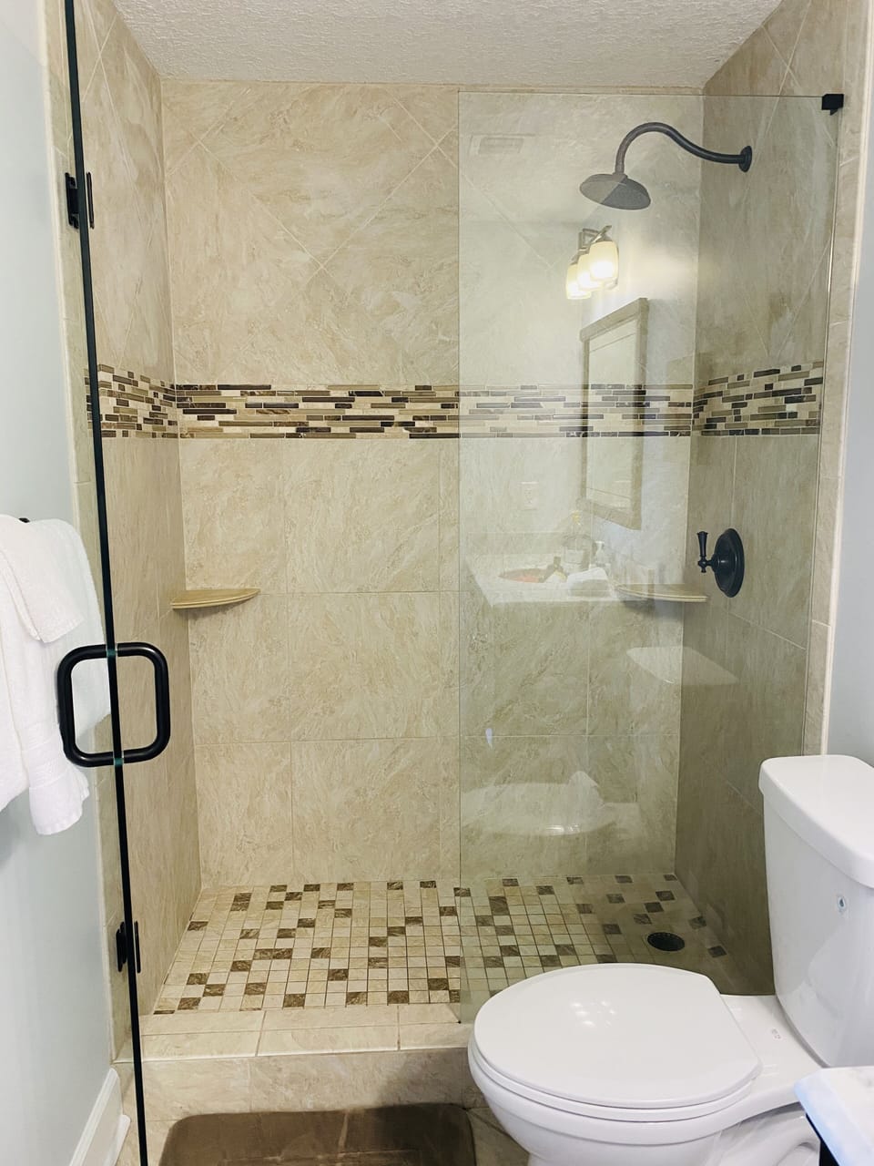 Walk in tile shower in the master bathroom.