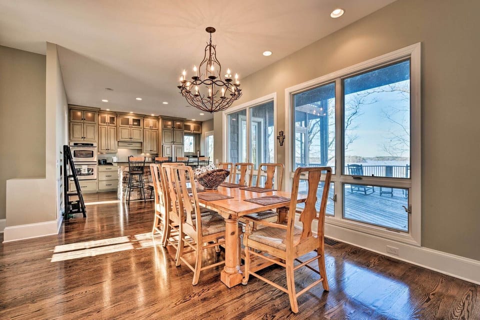 Large dining table and kitchen bar offer ample seating 