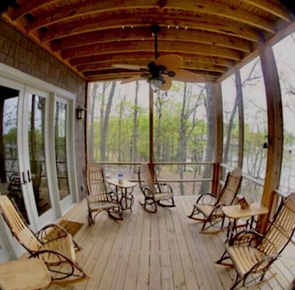 Rock your cares away on the downstairs screened porch