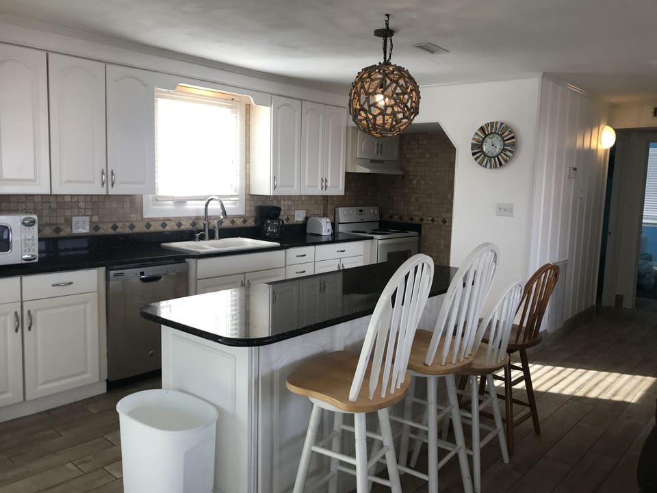 Kitchen with Granite Counter tops and Island