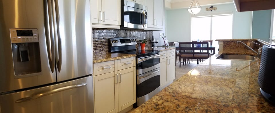 Kitchen fully stocked & equipped for your stay. 