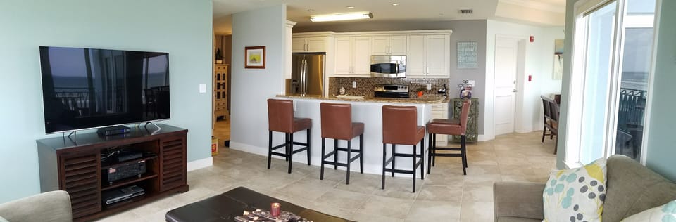 Living Room with 65" 4K HDTV.