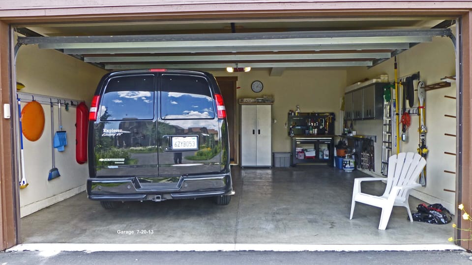 Garage with tools, ski & snow board racks & Sleds, Snow shovel, etc.