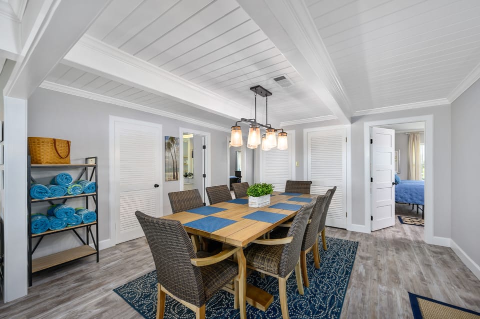 Dining room with imported 2" thick teak table and chairs.  